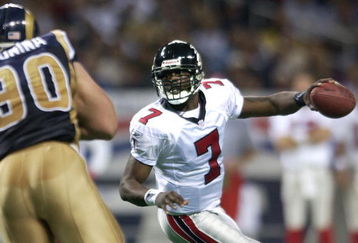 6 Jan 2002: Quarterback Michael Vick #7 of the Atlanta Falcons scrambles against the St. Louis Rams at the Dome at America's Center in St. Louis, Missouri. DIGITAL IMAGE. Mandatory Credit: Elsa /Getty Images