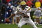 ATHENS, GA - NOVEMBER 29:  Quarterback Josh Nesbitt #9 of the Georgia Tech Yellow Jackets scrambles in the pocket during the game against the Georgia Bulldogs at Sanford Stadium on November 29, 2008 in Athens, Georgia.  The Yellow Jackets defeated the Bulldogs 45-42.  (Photo by Mike Zarrilli/Getty Images)