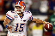 MIAMI - JANUARY 08: Quarterback Tim Tebow #15 of the Florida Gators looks to pass against the Oklahoma Sooners in the FedEx BCS National Championship Game at Dolphin Stadium on January 8, 2009 in Miami, Florida. (Photo by Donald Miralle/Getty Images)