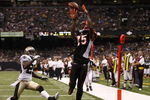 NEW ORLEANS - AUGUST 14:  Wide receiver Chris Henry #15 of the Cincinnati Bengals catches the ball in the end zone for a touchdown against Jason David #29 of the New Orleans Saints during the preseason game on August 14, 2009 at the Superdome in New Orleans, Louisiana. (Photo by Chris Graythen/Getty Images)