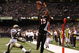 NEW ORLEANS - AUGUST 14:  Wide receiver Chris Henry #15 of the Cincinnati Bengals catches the ball in the end zone for a touchdown against Jason David #29 of the New Orleans Saints during the preseason game on August 14, 2009 at the Superdome in New Orleans, Louisiana. (Photo by Chris Graythen/Getty Images)