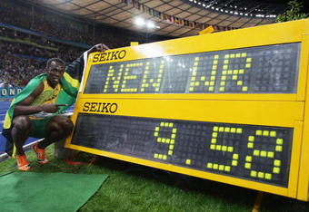 BERLIN - AUGUST 16:  Usain Bolt of Jamaica celebrates winning the gold medal in the men's 100 Metres Final during day two of the 12th IAAF World Athletics Championships at the Olympic Stadium on August 16, 2009 in Berlin, Germany. Bolt set a new World Record of 9.58.  (Photo by Mark Dadswell/Getty Images)