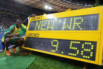 BERLIN - AUGUST 16:  Usain Bolt of Jamaica celebrates winning the gold medal in the men's 100 Metres Final during day two of the 12th IAAF World Athletics Championships at the Olympic Stadium on August 16, 2009 in Berlin, Germany. Bolt set a new World Record of 9.58.  (Photo by Mark Dadswell/Getty Images)