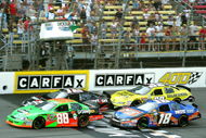 BROOKLYN, MI - AUGUST 15: Brad Kesolowski driver of the #88 leads Justin Allgaier driver of the #12 Verizon Wireless Dodge, Kyle Busch driver of the #18 NOS Energy drink Toyota and Brian Vickers driver of the #32 Dollar General Toyota during the NASCAR Nationwide Series at Michigan International Speedway on August 15, 2009 in Brooklyn, Michigan. (Photo by Jerry Markland/Getty Images for NASCAR)