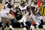 EAST RUTHERFORD, NJ - AUGUST 14: Jarrett Byers #87 of the St. Louis Rams rushes against the New York Jets during their preseason game at Giants Stadium on August 14, 2009  in East Rutherford, New Jersey.  (Photo by Nick Laham/Getty Images)