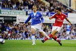 LIVERPOOL, ENGLAND - AUGUST 15:   Francesc Fabregas of Arsenal scores his team's fourth goal during the Barclays Premier League match between Everton and Arsenal at Goodison Park on August 15, 2009 in Liverpool, England. (Photo by Michael Regan/Getty Images)