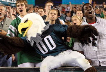 PHILADELPHIA - AUGUST 13: The Philadelphia Eagles mascot 'Swoop' celebrates with fans after a touchdown against the New England Patriots on August 13, 2009 at Lincoln Financial Field in Philadelphia, Pennsylvania.  (Photo by Jim McIsaac/Getty Images)