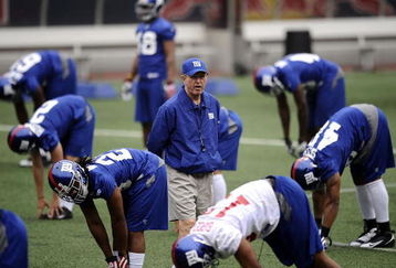 EAST RUTHERFORD, NJ - MAY 09: Tom Coughlin, head coach of the New York Giants walks on the field at rookie camp on May 9, 2009 in East Rutherford, New Jersey.  (Photo by Jeff Zelevansky/Getty Images)