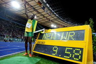 BERLIN - AUGUST 16: Usain Bolt of Jamaica celebrates winning the gold medal in the men's 100 Metres Final during day two of the 12th IAAF World Athletics Championships at the Olympic Stadium on August 16, 2009 in Berlin, Germany. Bolt set a new World Record of 9.58. (Photo by Mark Dadswell/Getty Images)