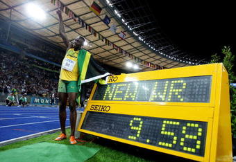 BERLIN - AUGUST 16:  Usain Bolt of Jamaica celebrates winning the gold medal in the men's 100 Metres Final during day two of the 12th IAAF World Athletics Championships at the Olympic Stadium on August 16, 2009 in Berlin, Germany. Bolt set a new World Record of 9.58.  (Photo by Mark Dadswell/Getty Images)