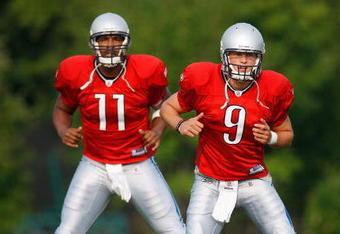 ALLEN PARK, MI - AUGUST 04:  Matthew Stafford #9 and  Daunte Culpepper #11 of the Detroit Lions warm up during training camp at the Detroit Lions Headquarters and Training Facility on August 4, 2009 in Allen Park, Michigan.  (Photo by Gregory Shamus/Getty Images)