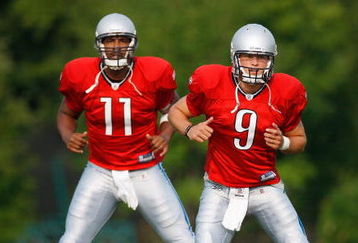 ALLEN PARK, MI - AUGUST 04:  Matthew Stafford #9 and  Daunte Culpepper #11 of the Detroit Lions warm up during training camp at the Detroit Lions Headquarters and Training Facility on August 4, 2009 in Allen Park, Michigan.  (Photo by Gregory Shamus/Getty Images)