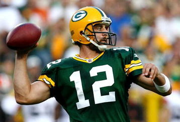 GREEN BAY, WI - AUGUST 15:  Quarterback Aaron Rodgers #12 of the Green Bay Packers passes the ball in the first quarter against the Cleveland Browns during the preseason game at Lambeau Field on August 15, 2009 in Green Bay, Wisconsin. (Photo by Jonathan Daniel/Getty Images)