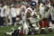 GLENDALE, AZ - FEBRUARY 03:  Defensive end Osi Umenyiora #72 of the New York Giants sits on Tom Brady #12 of the New England Patriots in the second quarter of Super Bowl XLII on February 3, 2008 at the University of Phoenix Stadium in Glendale, Arizona.  (Photo by Elsa/Getty Images)
