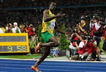 BERLIN - AUGUST 16: Usain Bolt of Jamaica crosses the line to win the gold medal in the men's 100 Metres Final during day two of the 12th IAAF World Athletics Championships at the Olympic Stadium on August 16, 2009 in Berlin, Germany. Bolt set a new World Record of 9.58. (Photo by Andy Lyons/Getty Images)