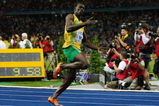 BERLIN - AUGUST 16: Usain Bolt of Jamaica crosses the line to win the gold medal in the men's 100 Metres Final during day two of the 12th IAAF World Athletics Championships at the Olympic Stadium on August 16, 2009 in Berlin, Germany. Bolt set a new World Record of 9.58. (Photo by Andy Lyons/Getty Images)