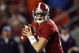 TUSCALOOSA, AL - NOVEMBER 29:  Quarterback Greg McElroy #12 of the Alabama Crimson Tide rolls out to pass against the Auburn Tigers at Bryant-Denny Stadium on November 29, 2008 in Tuscaloosa, Alabama. Alabama defeated Auburn 36-0.  (Photo by Doug Benc/Getty Images)