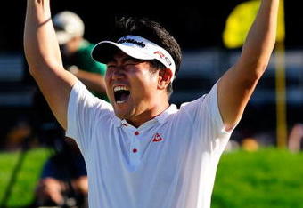 CHASKA, MN - AUGUST 16:  Y.E. Yang of South Korea celebrates his birdie putt on the 18th green during the final round of the 91st PGA Championship at Hazeltine National Golf Club on August 16, 2009 in Chaska, Minnesota.  (Photo by Sam Greenwood/Getty Images)