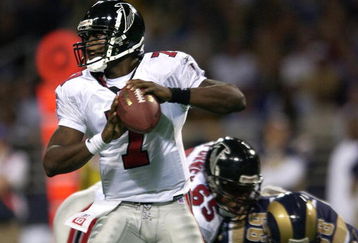 6 Jan 2002: Quarterback Michael Vick #7 of the Atlanta Falcons looks to pass against the St. Louis Rams at the Dome at America's Center in St. Louis, Missouri. DIGITAL IMAGE. Mandatory Credit: Elsa /Getty Images