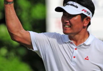 CHASKA, MN - AUGUST 16:  Y.E. Yang of South Korea celebrates after holing out for eagle on the 14th hole during the final round of the 91st PGA Championship at Hazeltine National Golf Club on August 16, 2009 in Chaska, Minnesota.  (Photo by Stuart Franklin/Getty Images)