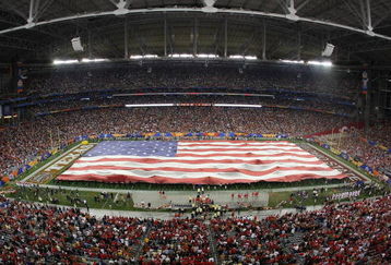 GLENDALE, AZ - JANUARY 05:  The National Anthem is performed before the Tostitos Fiesta Bowl Game between the Texas Longhorns and the Ohio State Buckeyes on January 5, 2009 at University of Phoenix Stadium in Glendale, Arizona.  The Longhorns defeated the Buckeyes 24-21. (Photo by Doug Pensinger/Getty Images)