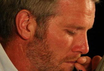 GREEN BAY, WI - MARCH 06: Quarterback Brett Favre of the Green Bay Packers tries to control his emotions at his retirement press conference on March 6, 2008 at Lambeau Field in Green Bay, Wisconsin. (Photo by Jonathan Daniel/Getty Images)