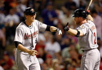 ARLINGTON, TX - JUNE 18:  Hunter Pence #8 of the Houston Astros celebrates a solo homerun with Darin Erstad #2 against the Texas Rangers on June 18, 2009 at Rangers Ballpark in Arlington, Texas.  (Photo by Ronald Martinez/Getty Images)