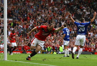 MANCHESTER, ENGLAND - AUGUST 16:  Wayne Rooney of Manchester United celebrates scoring the opening goal during the Barclays Premier League match between Manchester United and Birmingham City at Old Trafford on August 16, 2009 in Manchester, England.  (Photo by Alex Livesey/Getty Images)