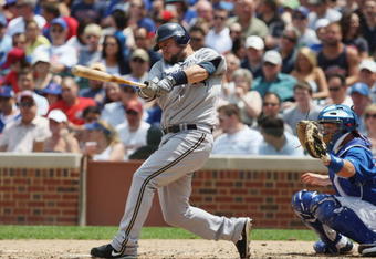 CHICAGO - JULY 03:  Casey McGehee  #14 of the Milwaukee Brewers at bat against the Chicago Cubs during their MLB game on July 3, 2009 at Wrigley Field in Chicago, Illinois. (Photo by Jonathan Daniel/Getty Images) 