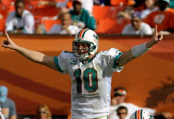 MIAMI, FL - JANUARY 4:  Quarterback Chad Pennington #10 of the Miami Dolphins directs play against the Baltimore Ravens during their AFC Wild Card Game at Dolphins Stadium on January 4, 2009 in Miami, Floirda.  (Photo by Al Messerschmidt/Getty Images)