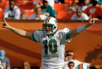 MIAMI, FL - JANUARY 4:  Quarterback Chad Pennington #10 of the Miami Dolphins directs play against the Baltimore Ravens during their AFC Wild Card Game at Dolphins Stadium on January 4, 2009 in Miami, Floirda.  (Photo by Al Messerschmidt/Getty Images)