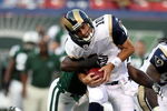 EAST RUTHERFORD, NJ - AUGUST 14:  Marc Bulger #10 of the St. Louis Rams is sacked against the New York Jets during their preseason game at Giants Stadium on August 14, 2009  in East Rutherford, New Jersey.  (Photo by Nick Laham/Getty Images)
