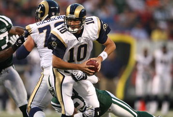 EAST RUTHERFORD, NJ - AUGUST 14: Marc Bulger #10 of the St. Louis Rams is sacked against the New York Jets during their preseason game at Giants Stadium on August 14, 2009  in East Rutherford, New Jersey.  (Photo by Nick Laham/Getty Images)