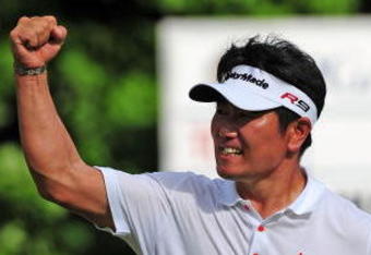 CHASKA, MN - AUGUST 16:  Y.E. Yang of South Korea celebrates after holing out for eagle on the 14th hole during the final round of the 91st PGA Championship at Hazeltine National Golf Club on August 16, 2009 in Chaska, Minnesota.  (Photo by Stuart Franklin/Getty Images)