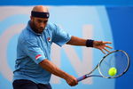 LONDON, ENGLAND - JUNE 14:  James Blake of USA plays a backhand during the men's final match against Andy Murray of Great Britain on Day 7 of the AEGON Championship at Queens Club on June 14, 2009 in London, England.  (Photo by Julian Finney/Getty Images)