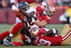 SAN FRANCISCO - AUGUST 14:  Running back Correll Buckhalter #28 of the Denver Broncos is tackled by Justin Smith #94 of the San Francisco 49ers during the preseason game on August 14, 2009 at Candlestick Park in San Francisco, California. (Photo by Jed Jacobsohn/Getty Images)