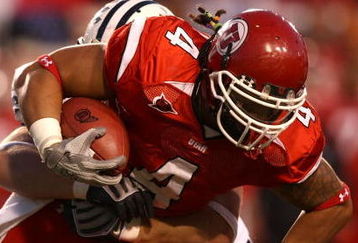 SALT LAKE CITY - NOVEMBER 22:  Matt Asiata #4 of the Utah Utes runs with the ball against the BYU Cougars at Rice-Eccles Stadium on November 22, 2008 in Salt Lake City, Utah.  (Photo by Jonathan Ferrey/Getty Images)