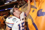 MIAMI - JANUARY 08:  Quarterback Tim Tebow #15 of the Florida Gators celebrates with fans after defeating the Oklahoma Sooners in the FedEx BCS National Championship Game at Dolphin Stadium on January 8, 2009 in Miami, Florida. The Gators won the game by a score of 24-14.  (Photo by Donald Miralle/Getty Images)