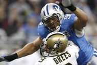 DETROIT - DECEMBER 21: Defensive end Ikaika Alama-Francis #97 of the Detroit Lions sacks quarterback Drew Brees #9 of the New Orleans Saints during the second quarter on December 21, 2008 at Ford Field in  Detroit, Michigan.  (Photo by Leon Halip/Getty Images)