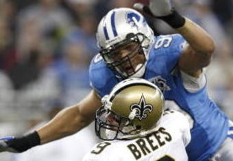 DETROIT - DECEMBER 21: Defensive end Ikaika Alama-Francis #97 of the Detroit Lions sacks quarterback Drew Brees #9 of the New Orleans Saints during the second quarter on December 21, 2008 at Ford Field in  Detroit, Michigan.  (Photo by Leon Halip/Getty Images)