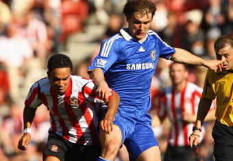 SUNDERLAND, UNITED KINGDOM - MAY 24:  Branislav Ivanovic of Chelsea competes for the ball with Kieran Richardson of Sunderland during the Barclays Premier League match between Sunderland and Chelsea at The Stadium of Light on May 24, 2009 in Sunderland, England. (Photo by Matthew Lewis/Getty Images)