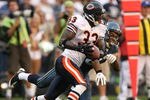 SEATTLE - AUGUST 16:  Cornerback Charles Tillman #33 of the Chicago Bears intercepts a pass against wide receiver Jordan Kent  #82 of the Seattle Seahawks at Qwest Field on August 16, 2008 in Seattle, Washington. (Photo by Otto Greule Jr/Getty Images)