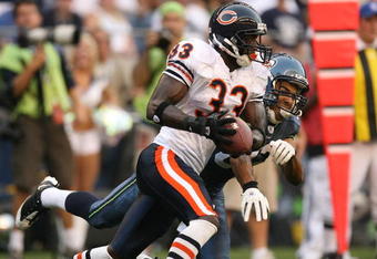 SEATTLE - AUGUST 16:  Cornerback Charles Tillman #33 of the Chicago Bears intercepts a pass against wide receiver Jordan Kent  #82 of the Seattle Seahawks at Qwest Field on August 16, 2008 in Seattle, Washington. (Photo by Otto Greule Jr/Getty Images)