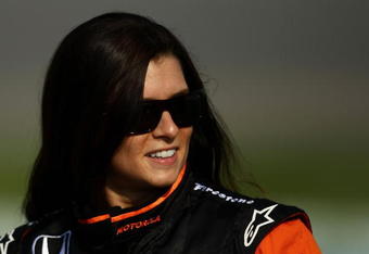 RICHMOND, VI - JUNE 26:  Danica Patrick, driver of the #7 Boost Mobile Andretti Green Racing Dallara Honda during practice for the IRL Indycar Series SunTrust Indy Challenge on June 26, 2009 at the Richmond International Speedway in Richmond, Virginia.  (Photo by Chris McGrath/Getty Images)