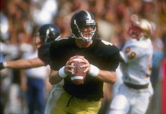 2 Sep 1989:  Quarterback Brett Favre of the Southern Mississippi Golden Eagles looks to pass while rolling out during the Golden Eagles 30-26 victory over the Florida State Seminoles at Roberts Stadium in Hattiesburg, Mississippi.  Mandatory Credit: Allen