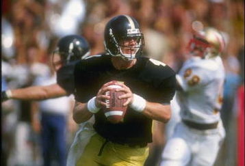 2 Sep 1989:  Quarterback Brett Favre of the Southern Mississippi Golden Eagles looks to pass while rolling out during the Golden Eagles 30-26 victory over the Florida State Seminoles at Roberts Stadium in Hattiesburg, Mississippi.  Mandatory Credit: Allen