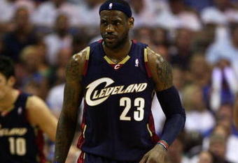 ORLANDO, FL - MAY 30:  LeBron James #23 of the Cleveland Cavaliers looks on between plays against the Orlando Magic in Game Six of the Eastern Conference Finals during the 2009 Playoffs at Amway Arena on May 30, 2009 in Orlando, Florida. NOTE TO USER: User expressly acknowledges and agrees that, by downloading and or using this photograph, User is consenting to the terms and conditions of the Getty Images License Agreement  (Photo by Elsa/Getty Images)