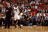 MIAMI - NOVEMBER 21: Head coach Pat Riley and Dwyane Wade #3 of the Miami Heat talk during free throws while taking on the Atlanta Hawks at American Airlines Arena on November 21,  2007 in Miami, Florida.  NOTE TO USER: User expressly acknowledges and agrees that, by downloading and or using this photograph, User is consenting to the terms and conditions of the Getty Images License Agreement.  (Photo by Doug Benc/Getty Images)