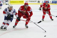 ZURICH, SWITZERLAND - APRIL 30:  Mats Zuccarello Aasen of Norway (L) challenges Viktor Kostiuchenok of Belarus during the IIHF World Championship match between Belarus and Norway at the  Arena Zurich-Kloten on April 30, 2009 in Zurich, Switzerland.  (Photo by Mike Hewitt/Getty Images)