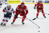ZURICH, SWITZERLAND - APRIL 30:  Mats Zuccarello Aasen of Norway (L) challenges Viktor Kostiuchenok of Belarus during the IIHF World Championship match between Belarus and Norway at the  Arena Zurich-Kloten on April 30, 2009 in Zurich, Switzerland.  (Photo by Mike Hewitt/Getty Images)